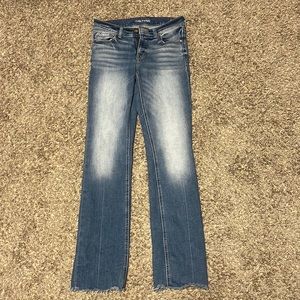 I am selling Maurice size 6 boot cut dark wash jeans